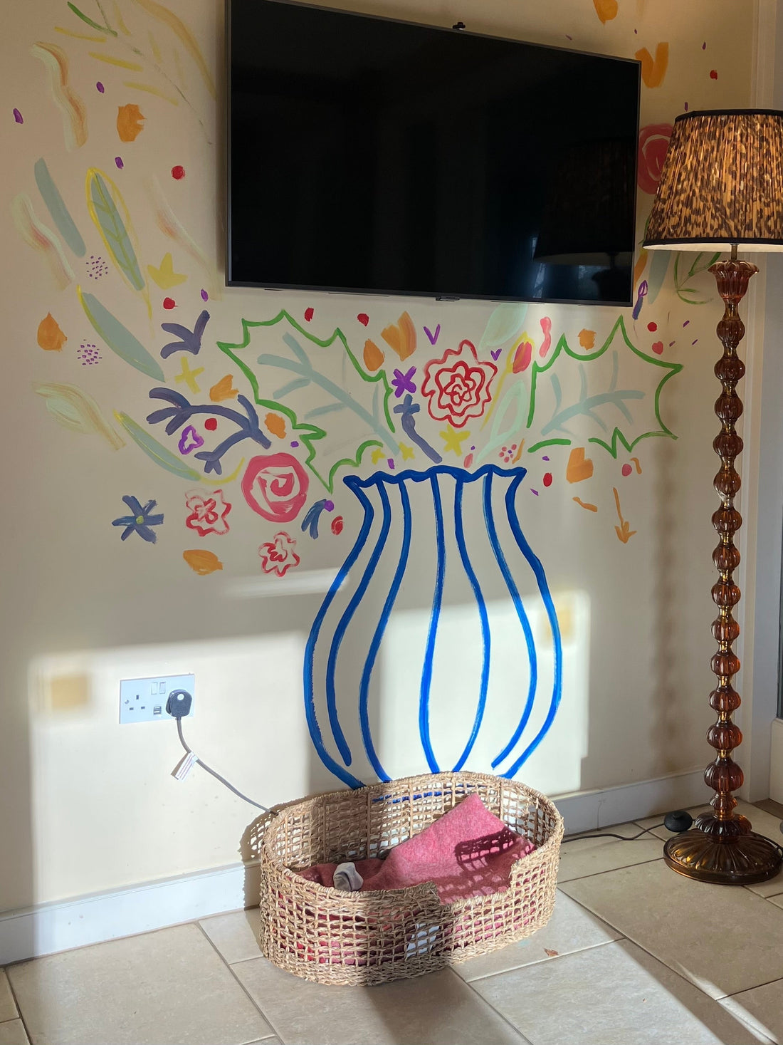 Flowers in vase painted onto a wall