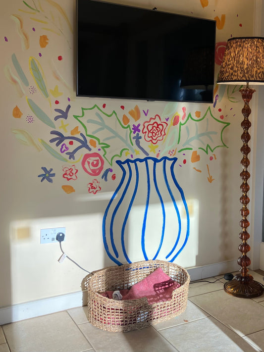 Flowers in vase painted onto a wall